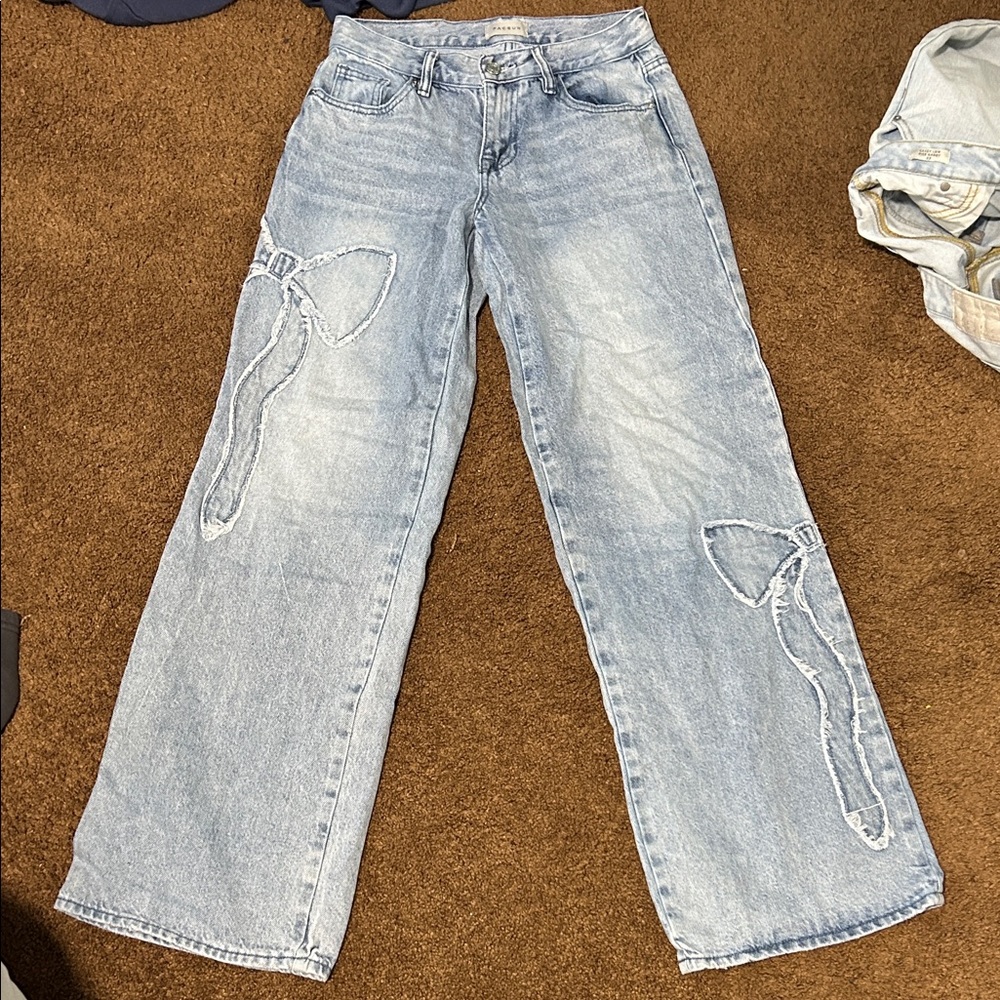 PacSun Light Blue Flare Jeans with Bow Accents